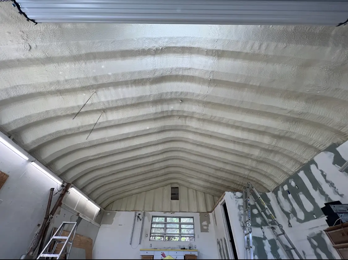 Spray polyurethane foam applied to the underside of a metal roof deck in Marlow Heights